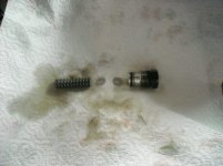 kubota pressure relief valve , spring, and shims.jpg