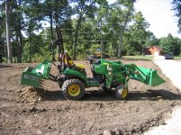 tractor in prefinish yard.jpg