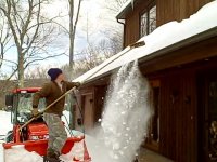 Kubota B3030 Clearing Roof Snow.jpg