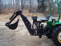 5-110408-libertiesbackhoe7000.jpg