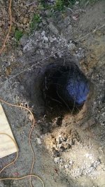 24 inch x 5 ft hole with concrete.jpg