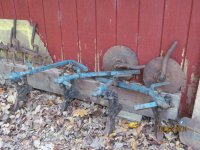 Farmall cultivator plows.JPG