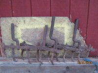 Farmall cultivator rakes.JPG