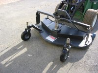 623829-New Wheels on Mower.JPG