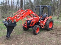 Tractor w new stump bucket.jpg