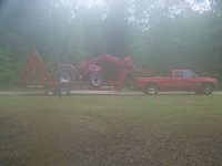 Red truck, trailer, and new tractor.jpg