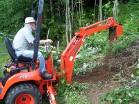 Dad Learning the Backhoe.jpg