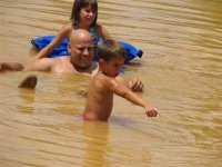 Me and the kids swimming in our pond, July 2006.jpg