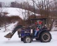 327482-ed_on_tractor_closeup.jpg