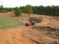 21  Dump truck heading back to the dirt pile with a good view of part of the pasture.jpg