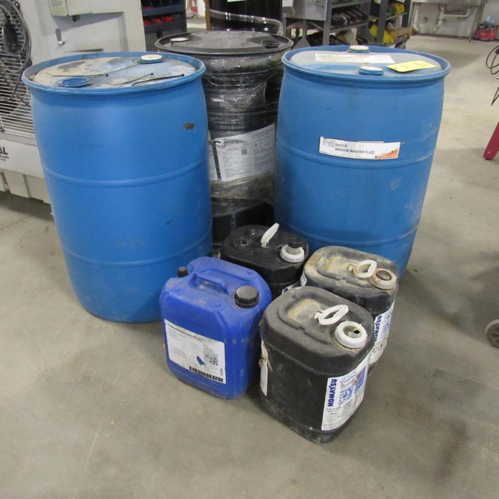LOT: (2) Almost Full Jugs of Komatsu Coolant, (1) Almost Full Jug of Liebherr Coolant, 1/3 Barrell (A59076)