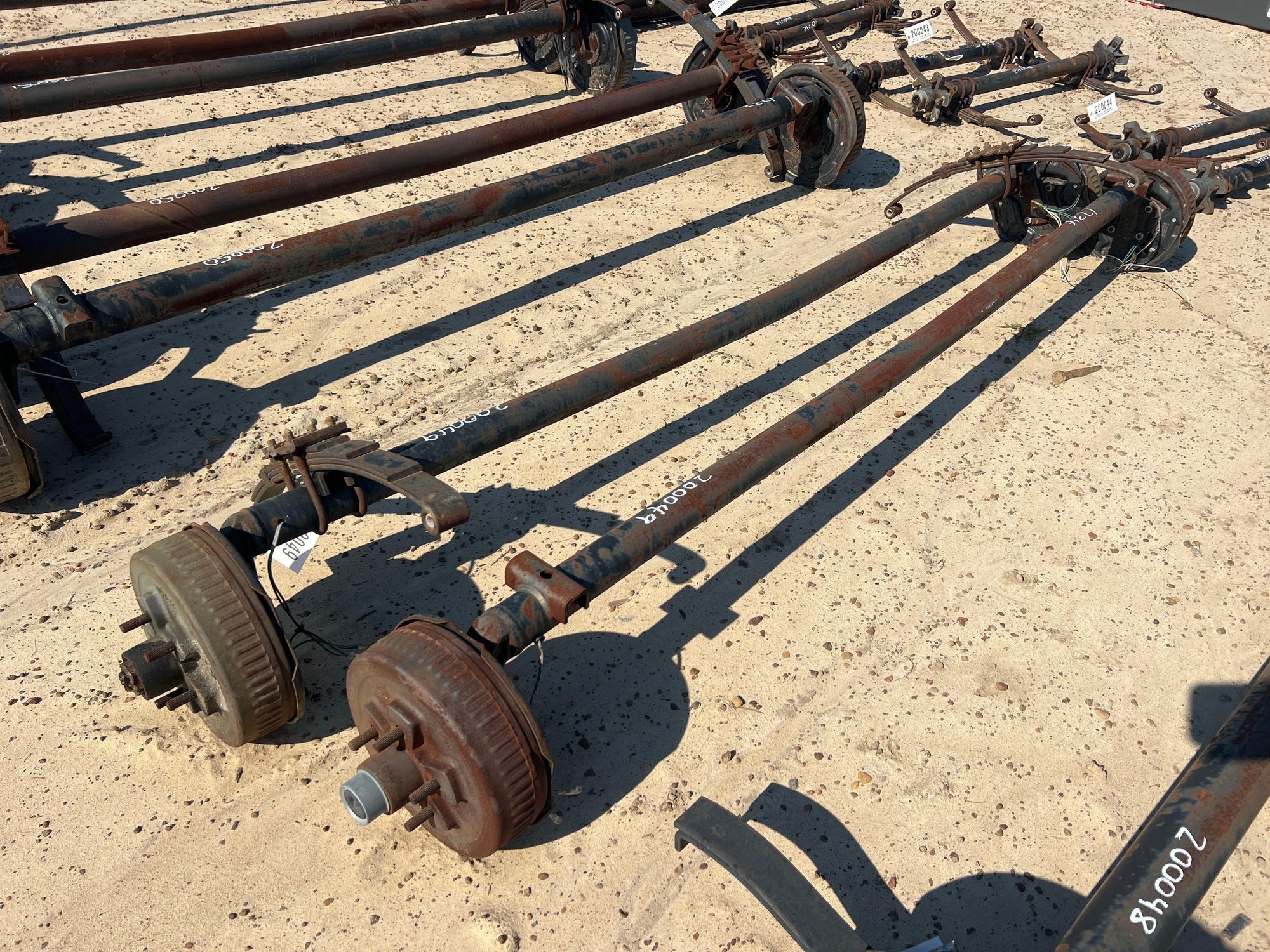 (2) UNUSED 3500# DROP AXLES W/ BRAKES (A51247)