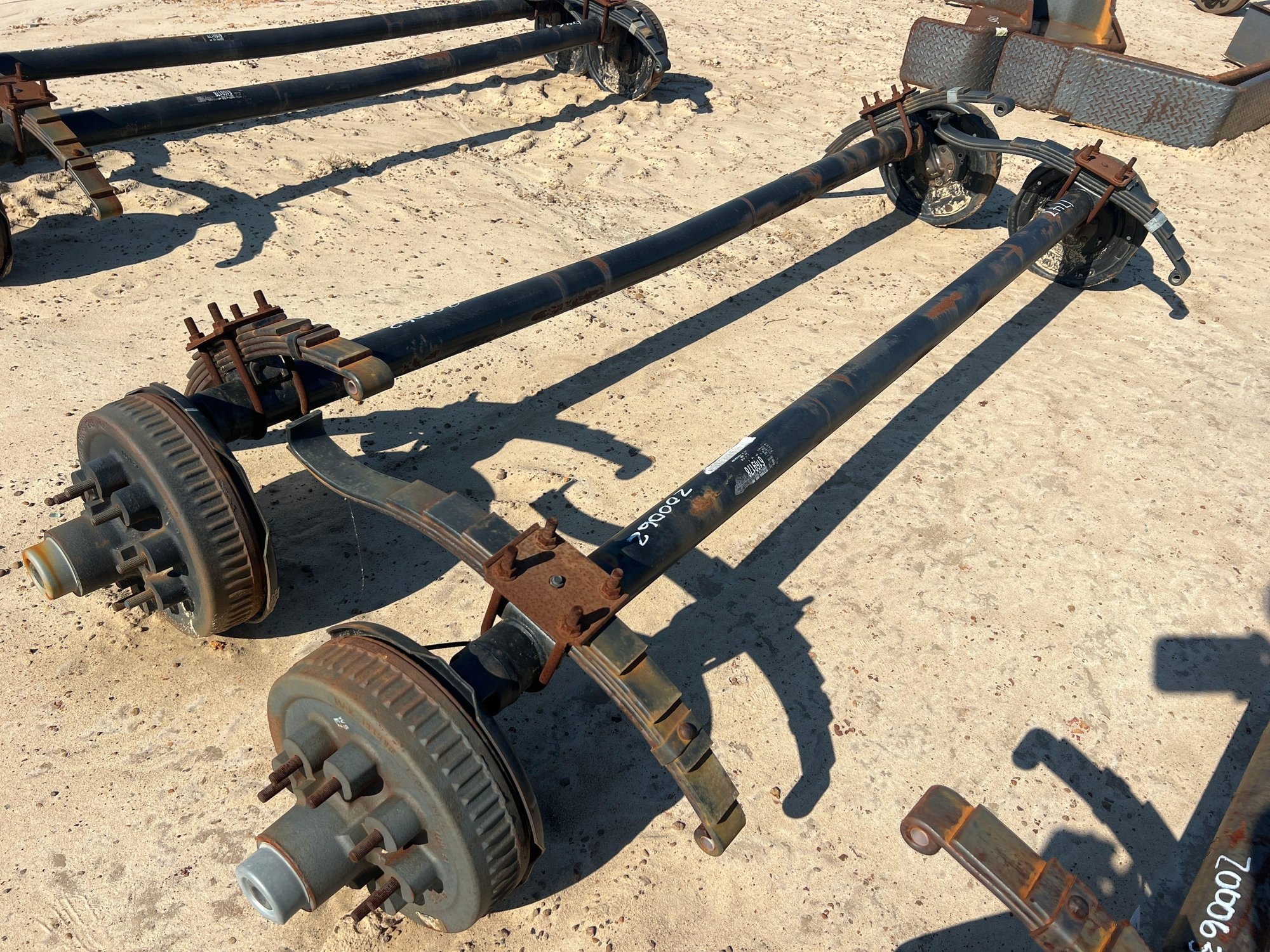 (2) UNUSED 7000# DROP AXLES W/ BRAKES (A51247)