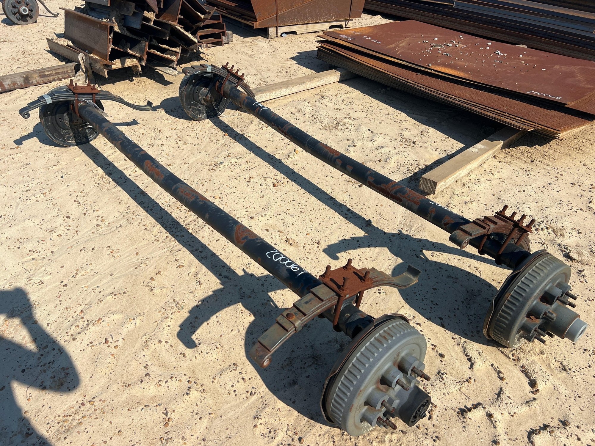 (2) UNUSED 7000# DROP AXLES W/ BRAKES (A51247)