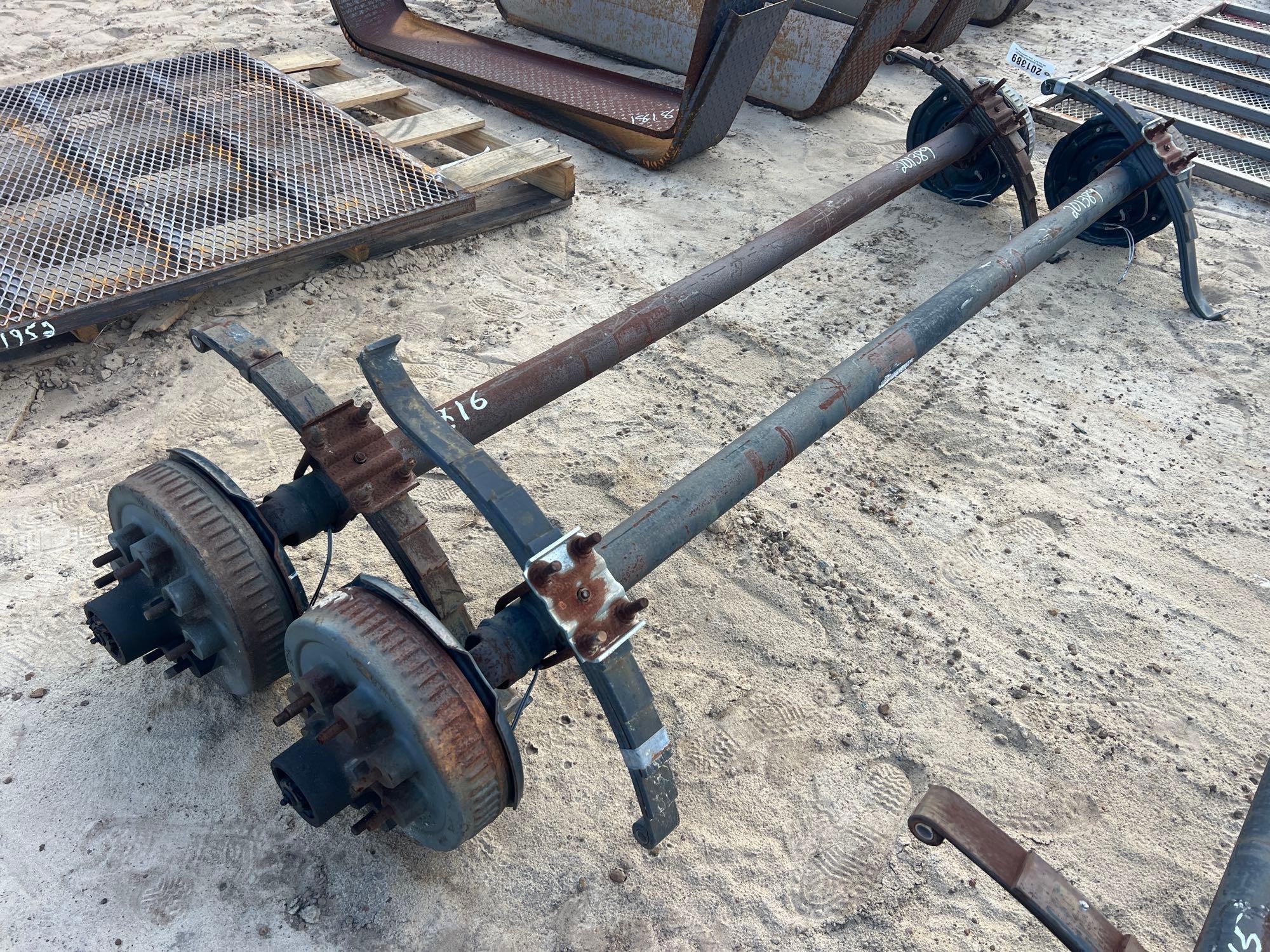 UNUSED (2) 7000# DROP AXLES W/ BRAKES (A54756)