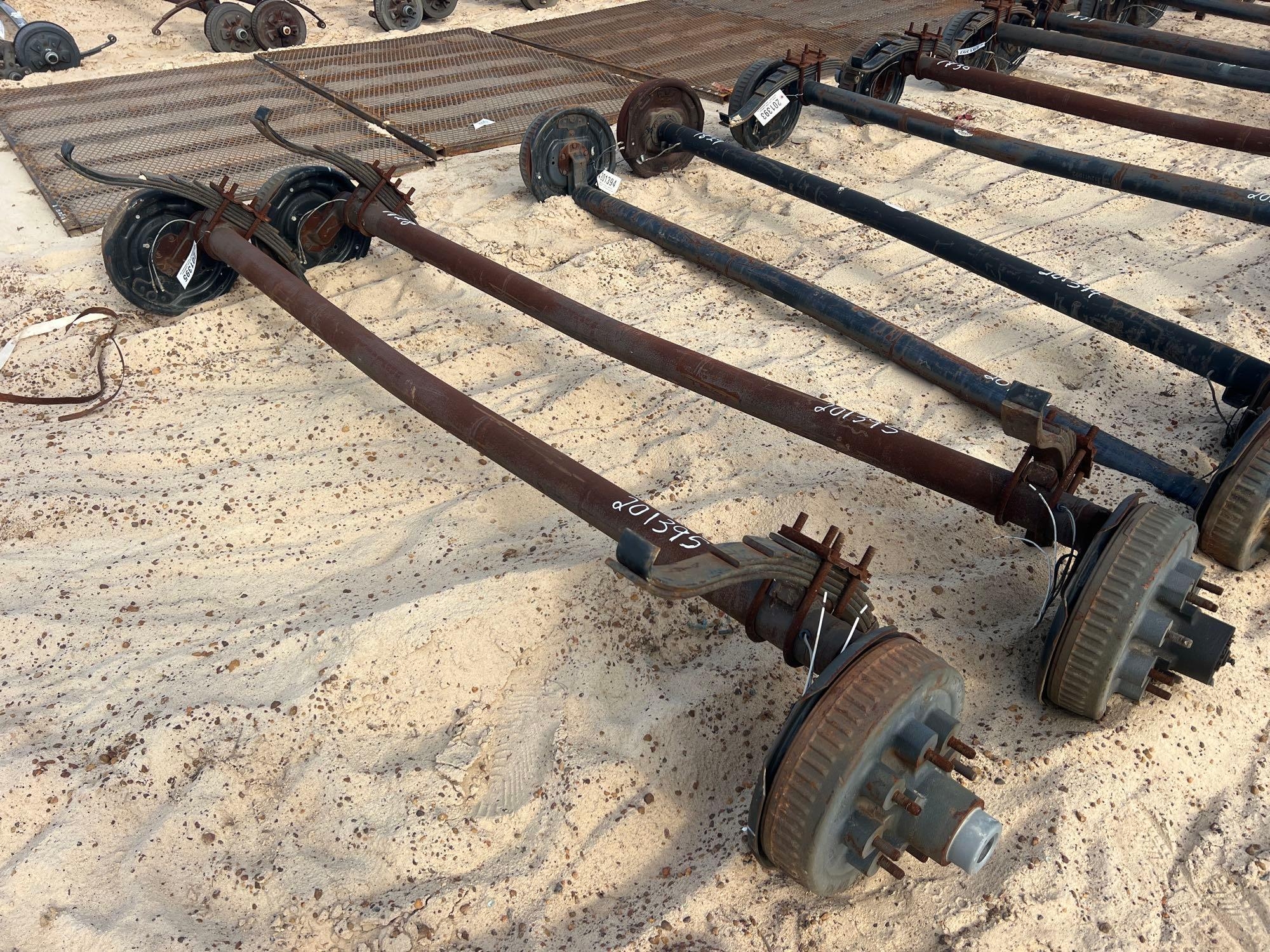 UNUSED (2) 7000# DROP AXLES W/ BRAKES (A54756)