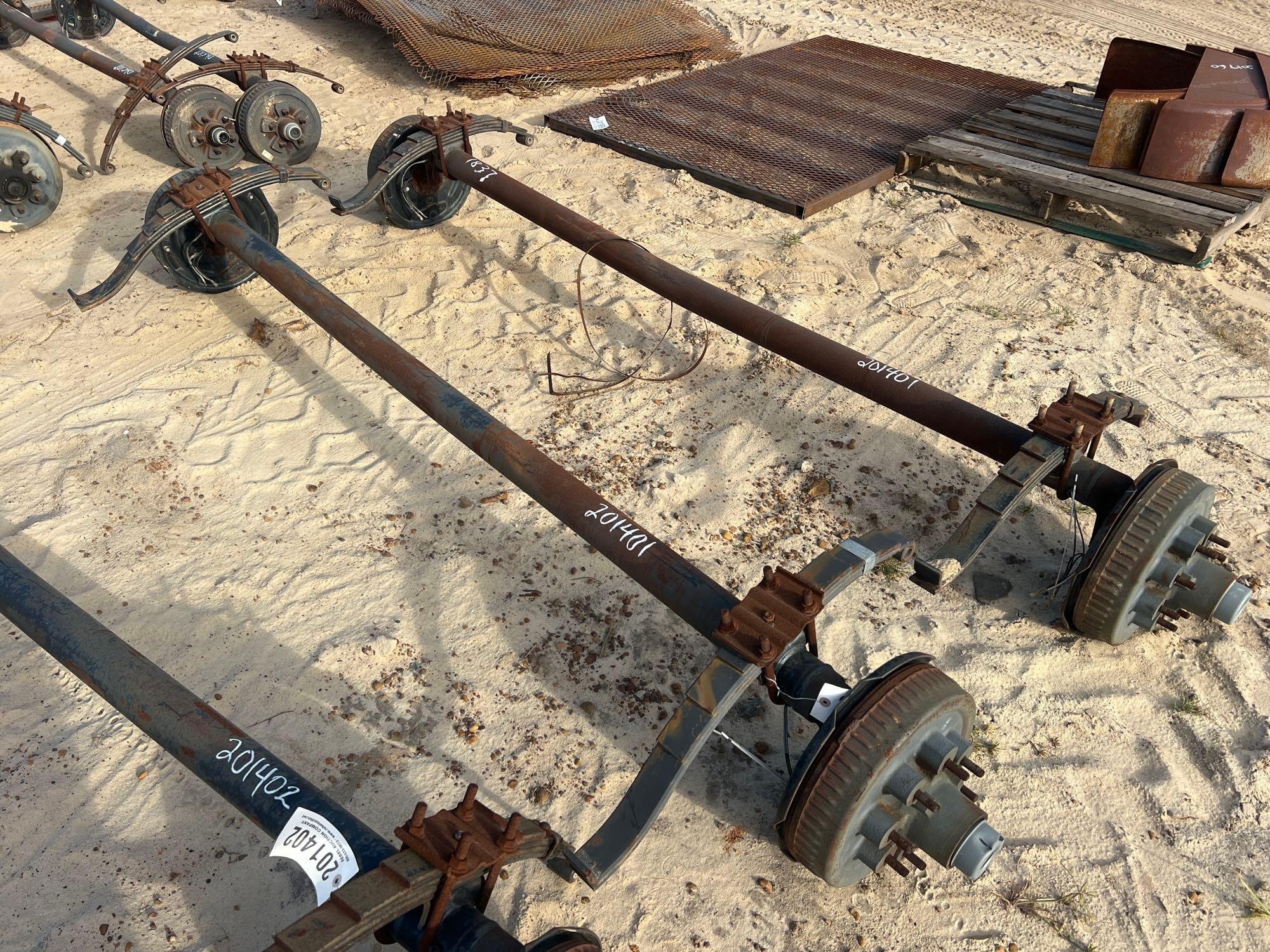 UNUSED (2) 7000# DROP AXLES W/ BRAKES (A54756)