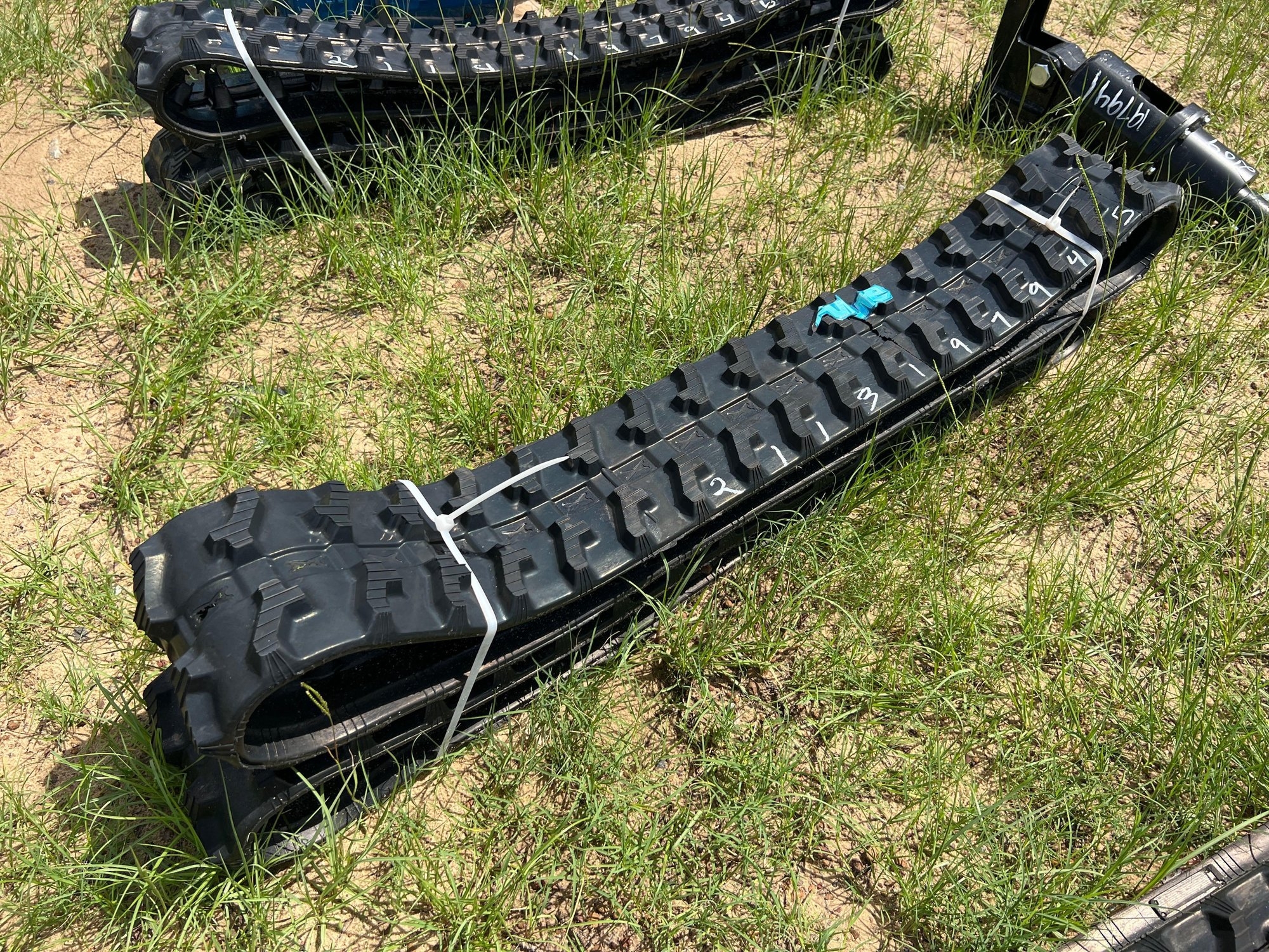 UNUSED FUTURE PAIR OF MINI RUBBER TRACKS (A51244)