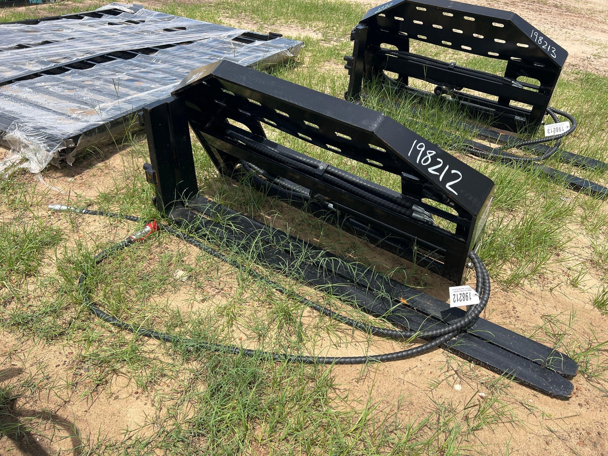 UNUSED FUTURE SKID STEER SIDE SHIFT FORKS (A51244)