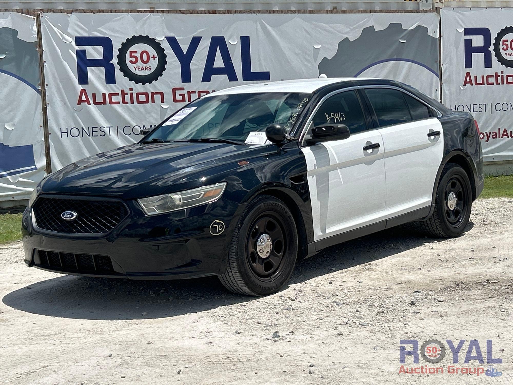 Year: 2014 Make: Ford Model: Taurus Vehicle Type: Passenger Car Mileage: Plate: Body Type: 4 Door (A51694)