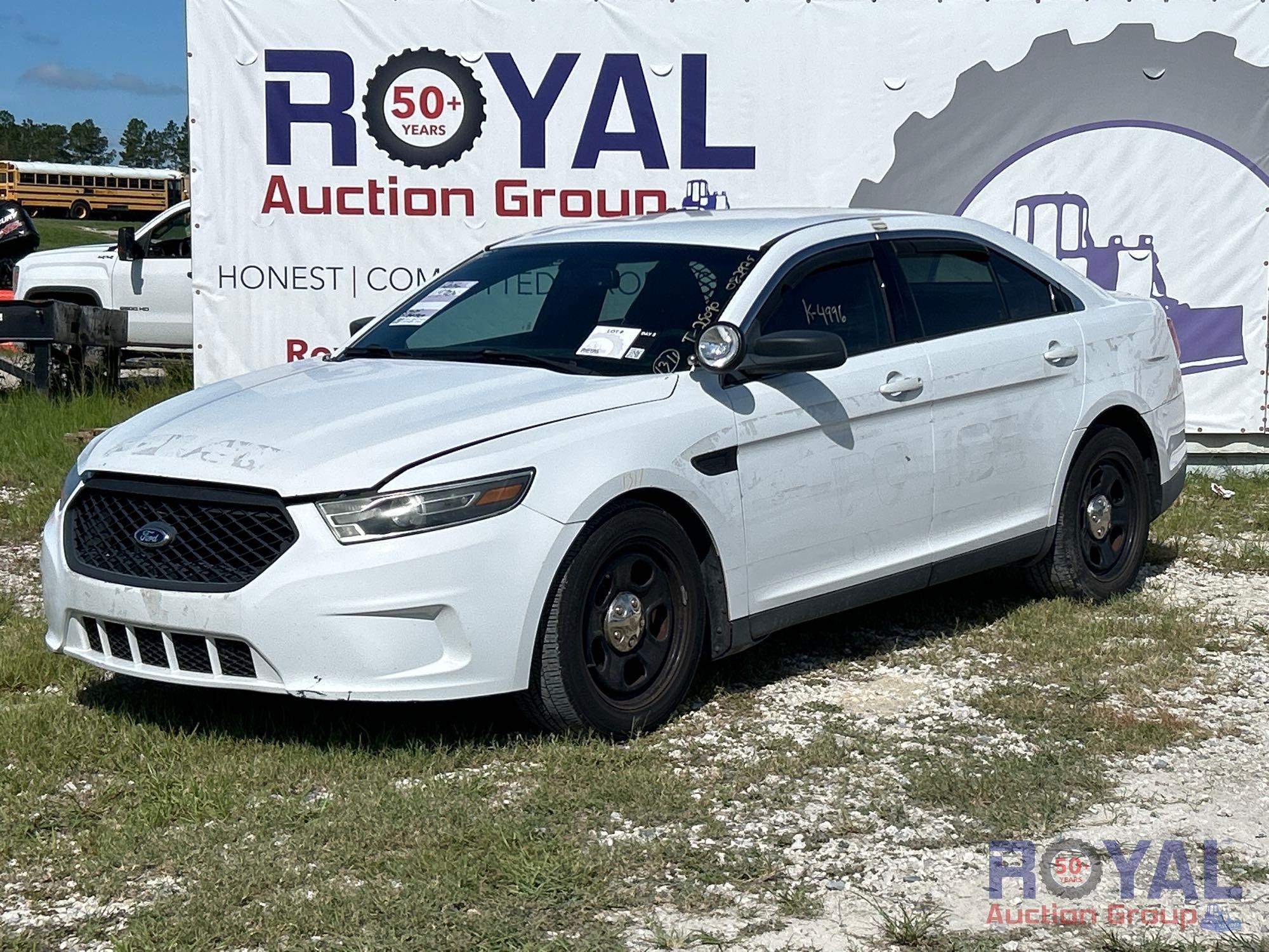 Year: 2015 Make: Ford Model: Taurus Vehicle Type: Passenger Car Mileage: Plate: Body Type: 4 Door (A51694)