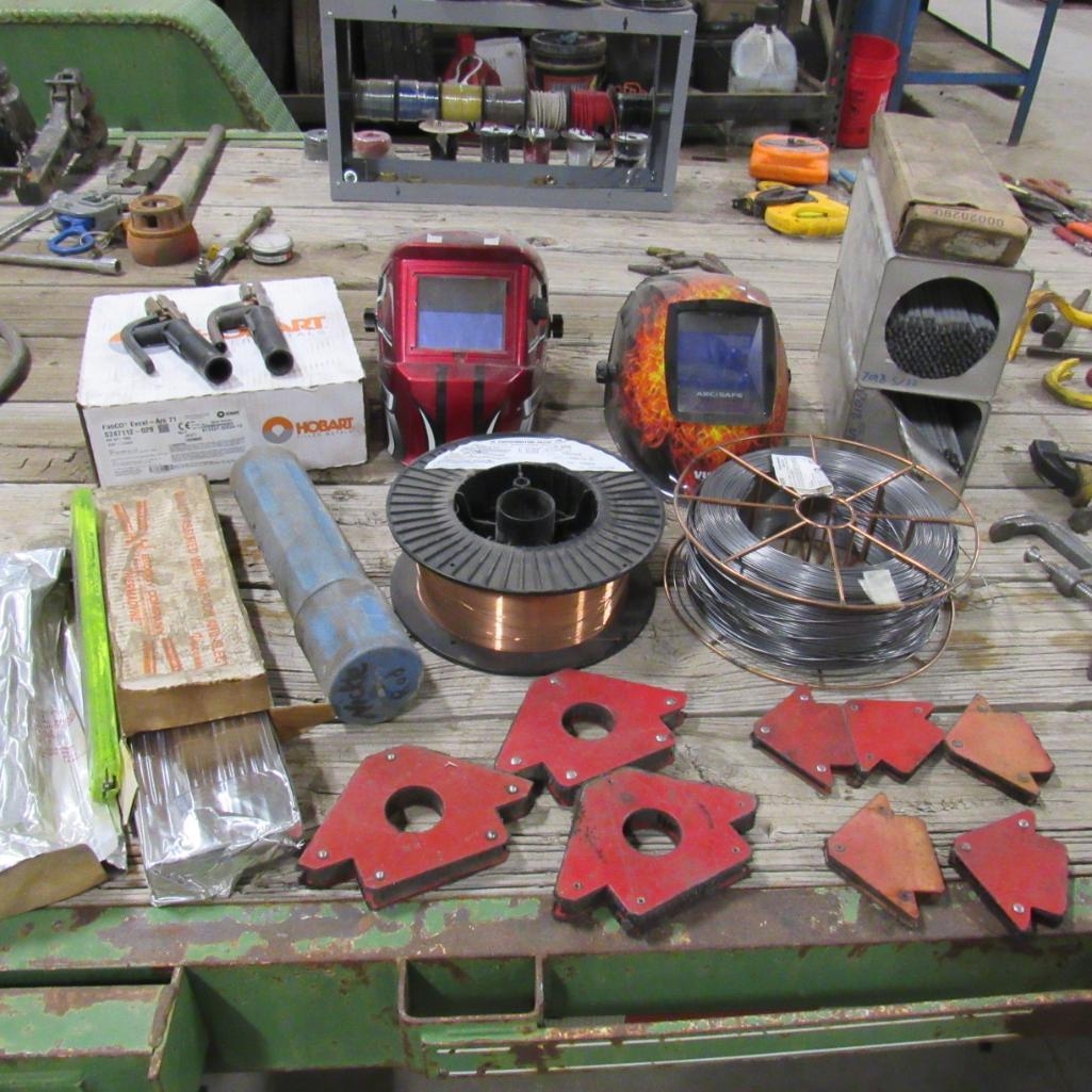 LOT: Welding Accessories: (2) Auto Darkening Helmets, Welding Rods, Welding Wire, Magnetic Arrows (A59076)