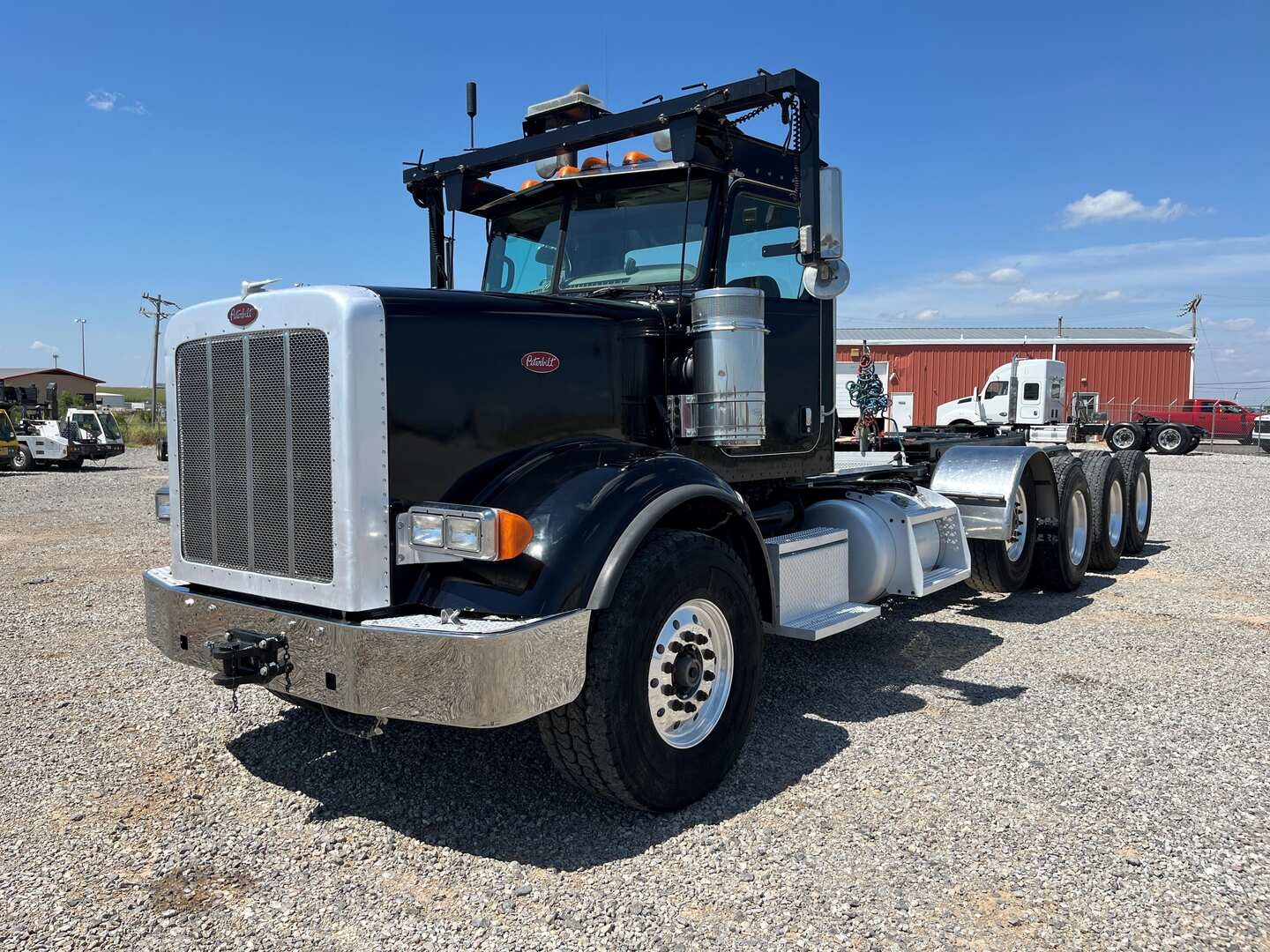 2011 PETERBILT 367 TRI-DRIVE WITH TAG (A52472)