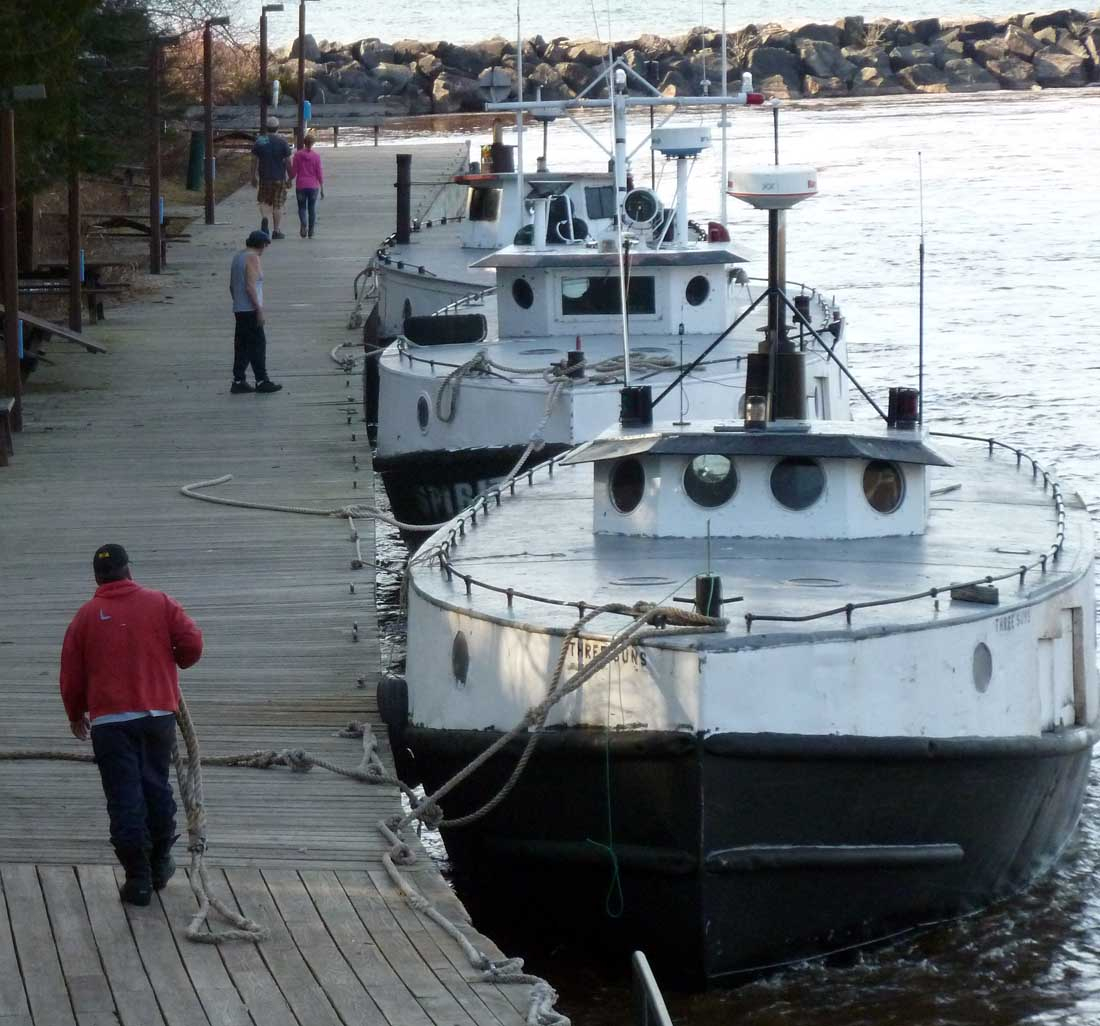 Black river fishing boat parked (DL).jpg