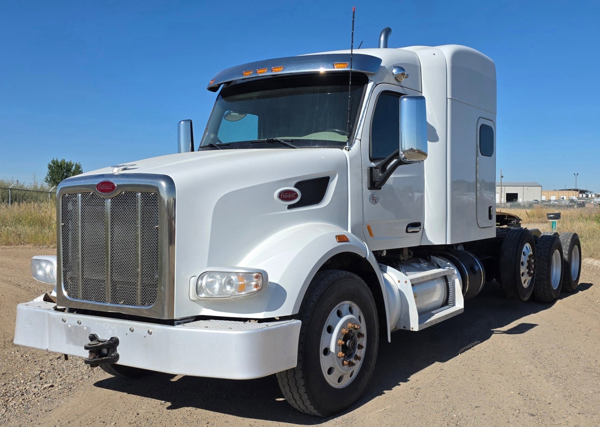 2019 PETERBILT 567 TRI-AXLE MID-ROOF SLEEPER (A52472)
