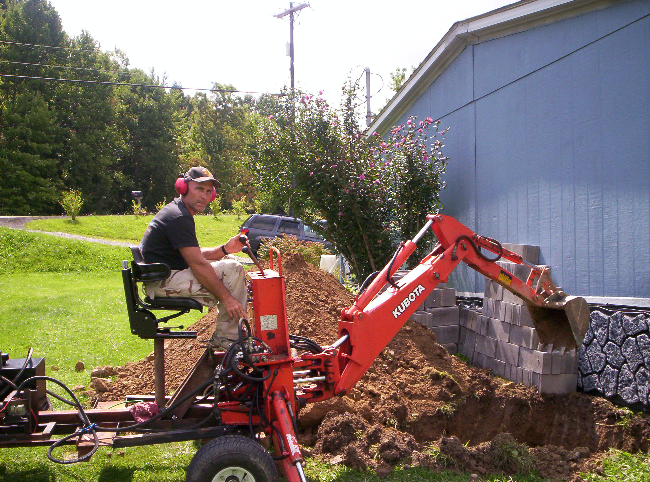 digging storm shelter with towable 003.JPG