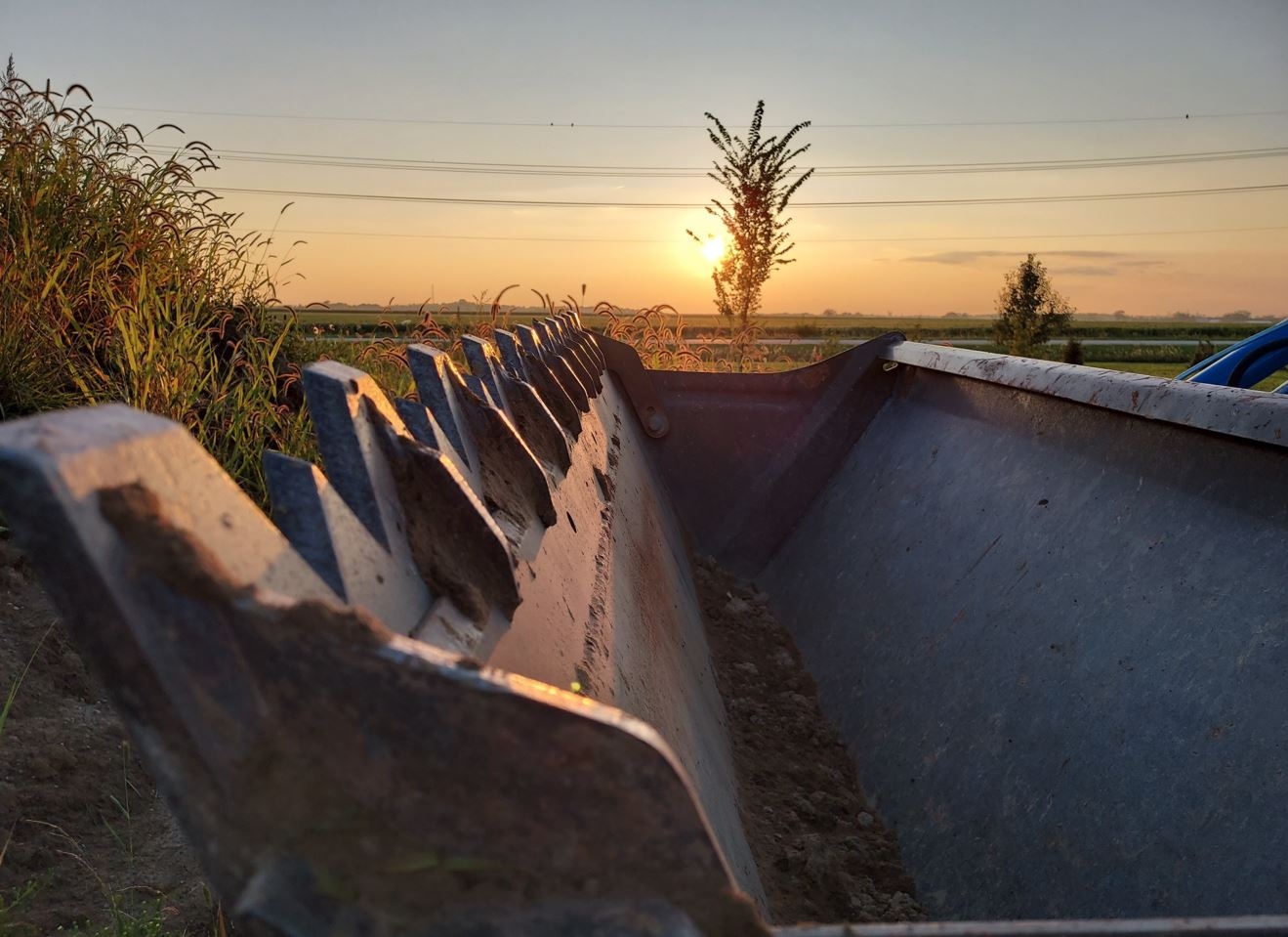 EveningTractorBucket9-10-23.JPG