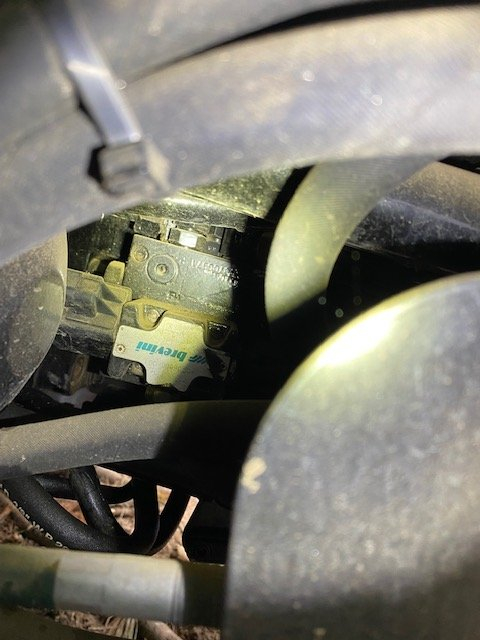 hose connected to block with writing.jpg