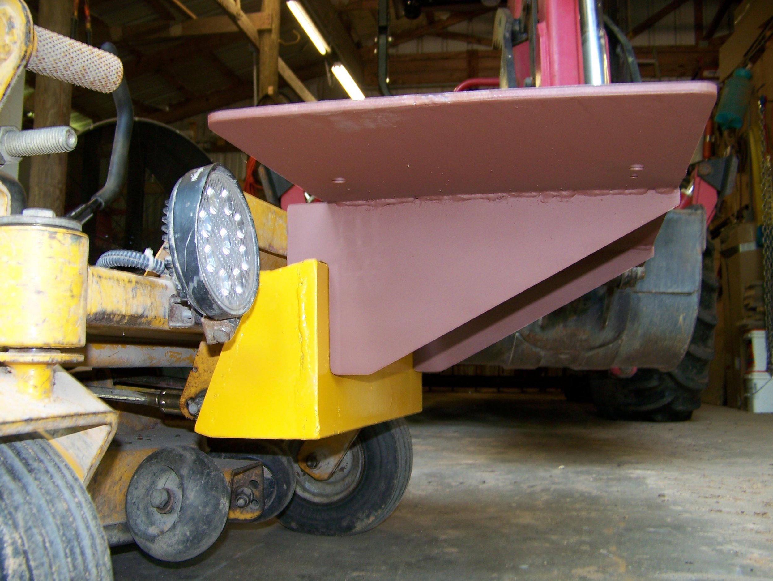 Lawnmower Sprayer Mount Primed & Hanging.jpg