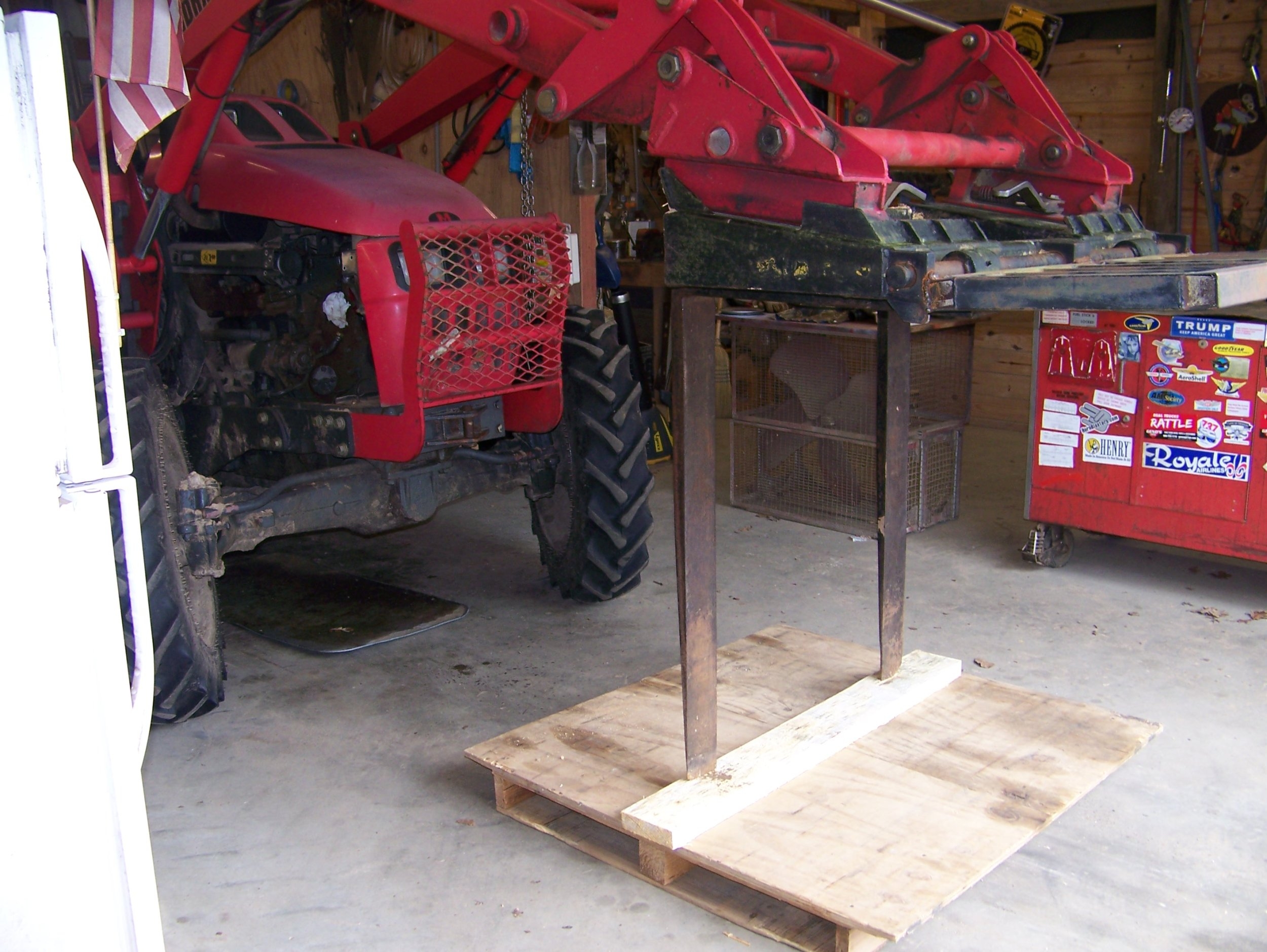 Mahindra Forks Down Arms Up In Barn 2022.jpg