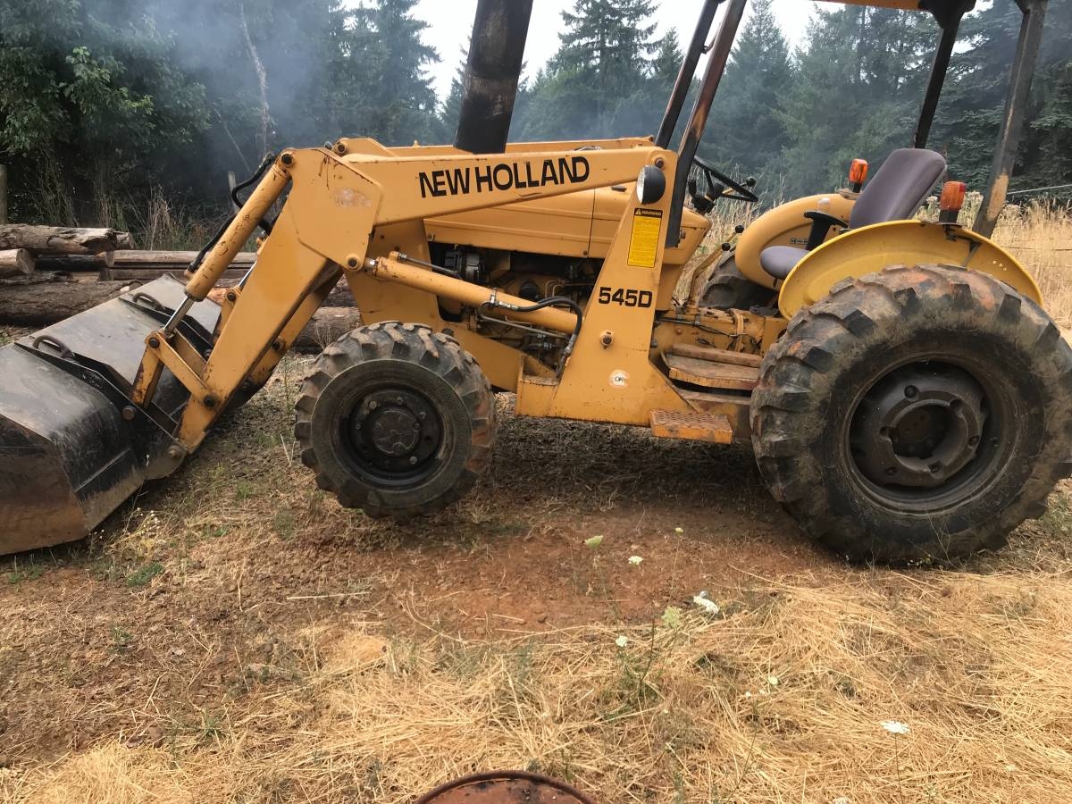 New Holland 545d-left.jpg