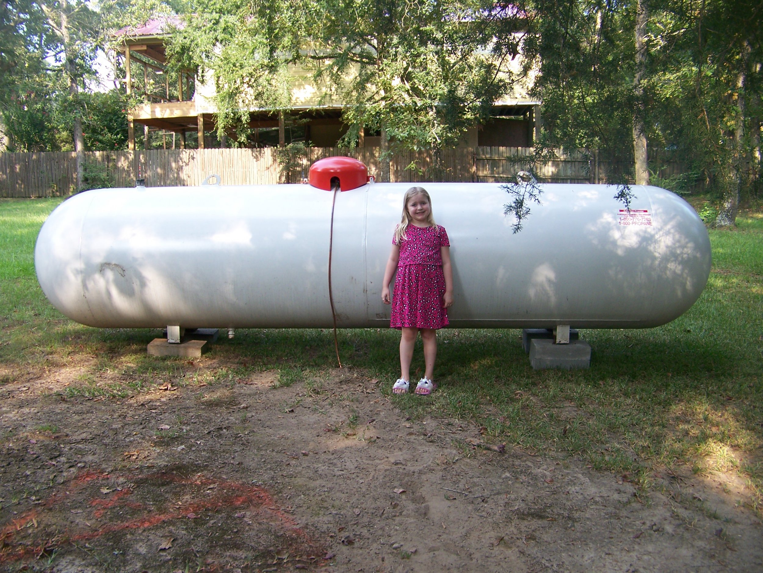 Propane Tank 1000 Gallon & Chloe.jpg