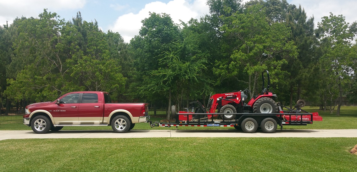 Rig and Tractor Loaded out with implements sized.jpg
