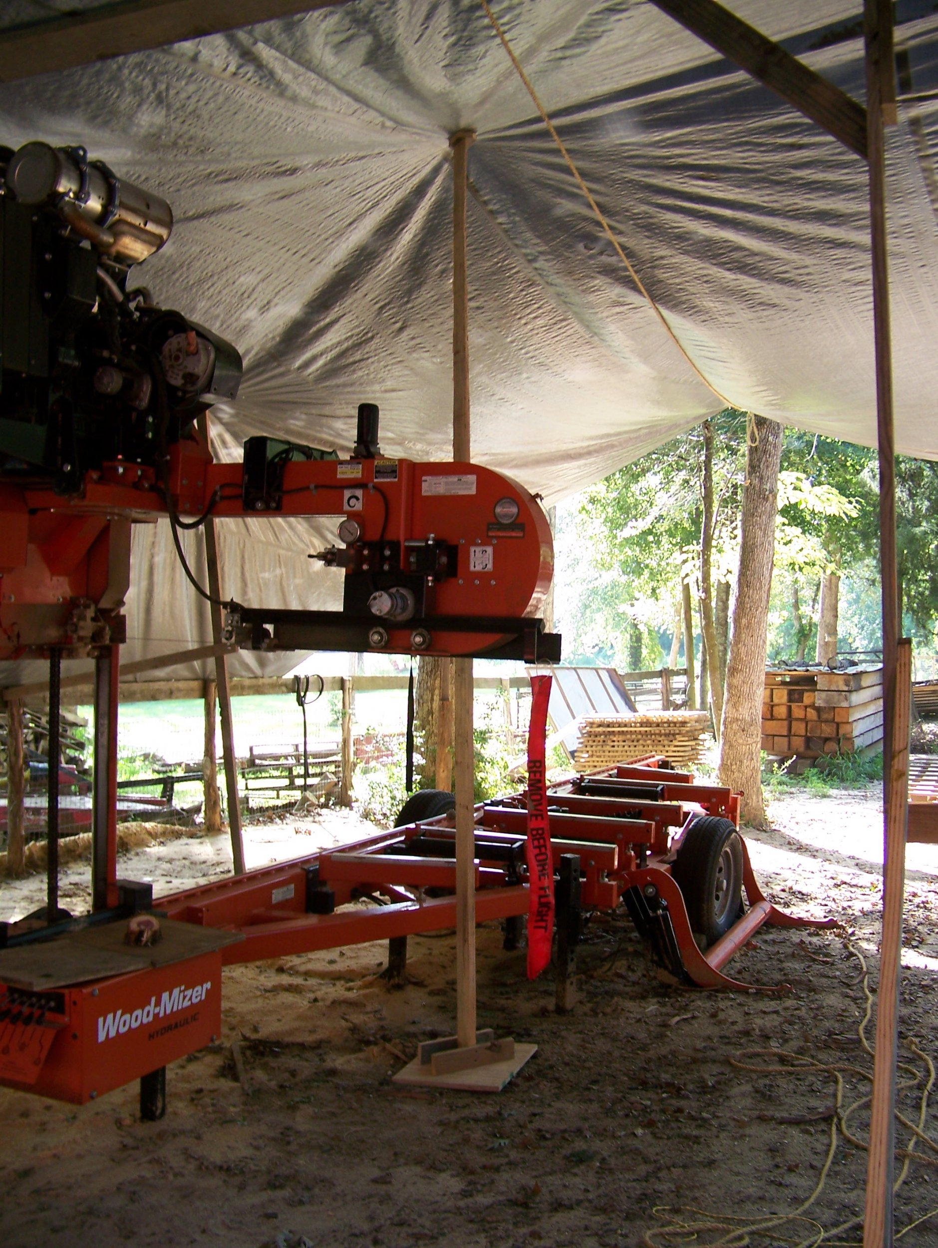 Sawmill Tarped Movable Support Pole.jpg