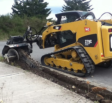 skid-steer-with-sidetrencher.jpg