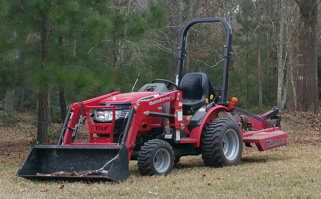 Small tractor and operator for auction item smaller.jpg