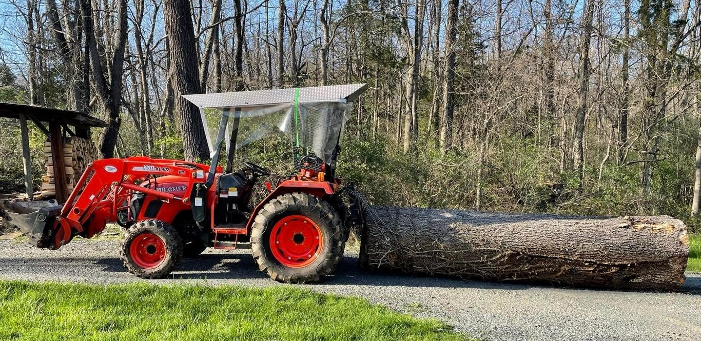 Tactor with big log (3).jpg