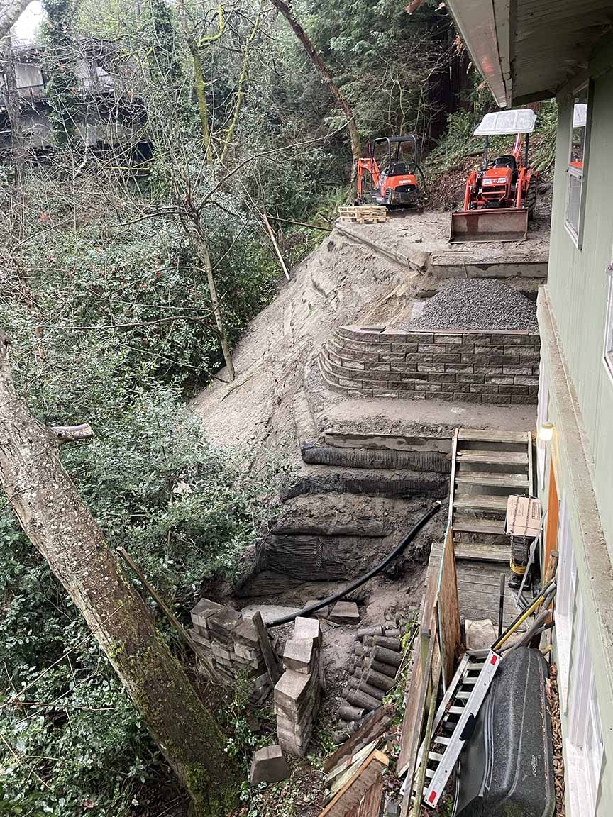 upper wall and gravel waterfall, lower wall started.jpg