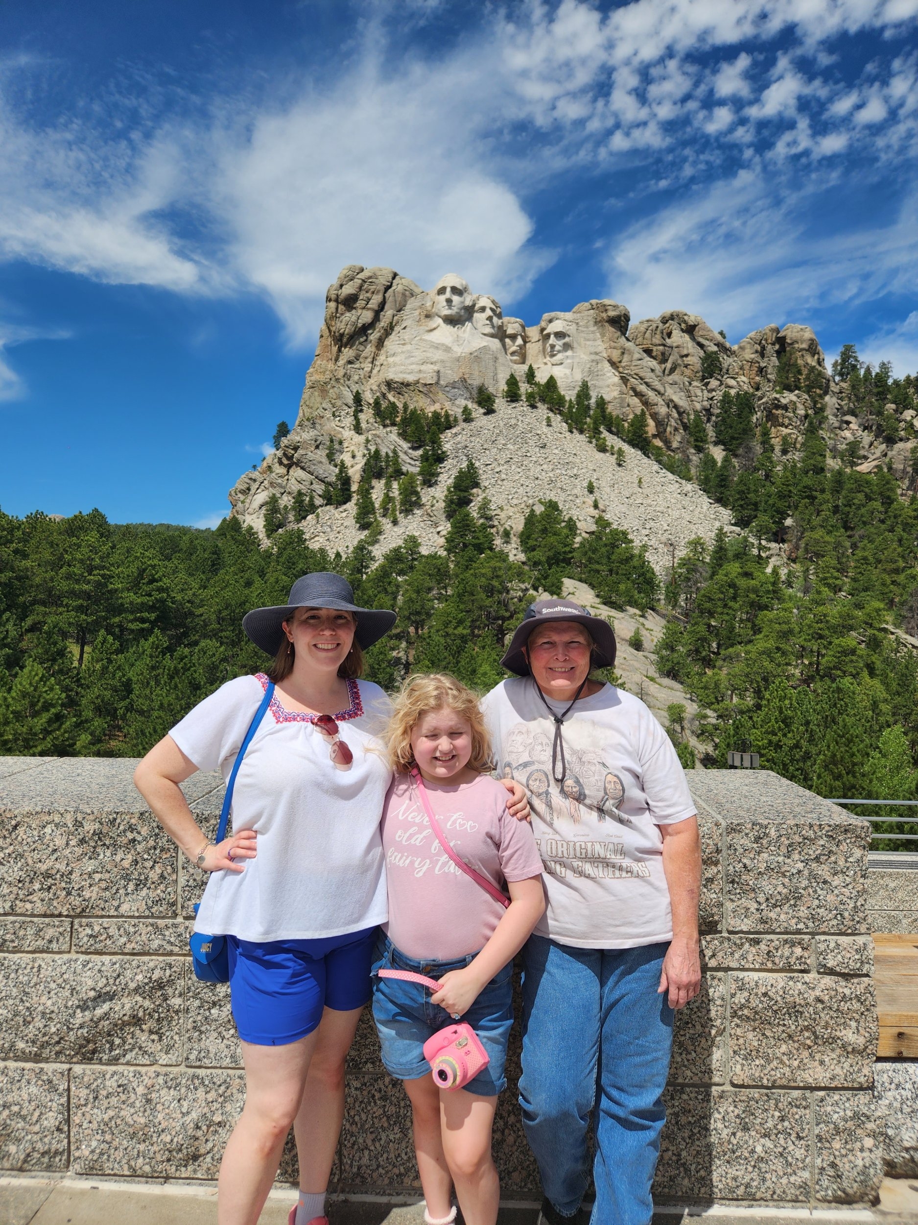 Vacation 2023 Rebecca, Chloe and I in Front of Mount Rushmore.jpg