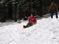 27  Alissa on a sled in the Sierra Nevada Mountains.jpg