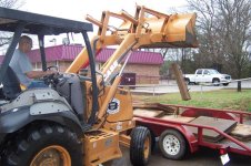 FIL loading slab onto my trailer with the backhoe.jpg