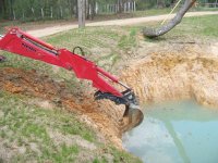 3-7-09 Starting the water trough supply pipe ditch.jpg