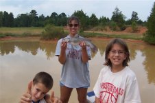 22 Sep 2007, Steph and the kids with a nice catfish!!.jpg