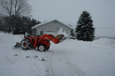 light duty bucket loaded with snow.JPG