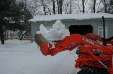 light duty bucket with snow up close.JPG