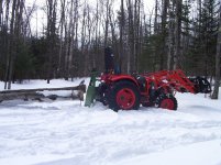 Loggin with the Kioti 001.jpg